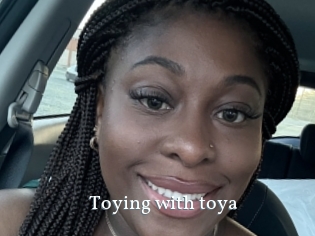 Toying_with_toya